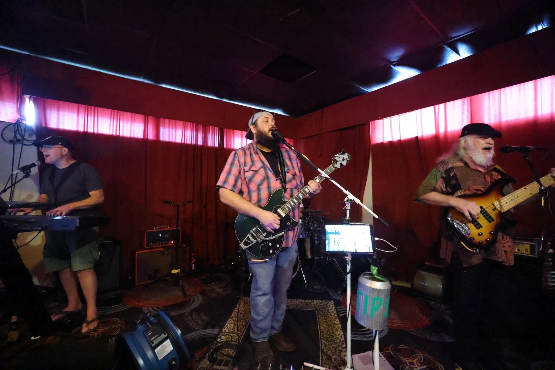 The Bayou Gipsies guitar and bass players performing together