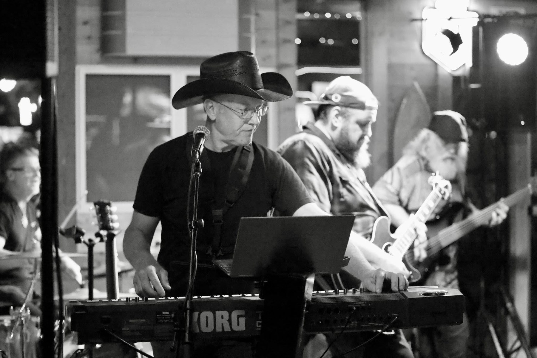 Bayou Gipsies ensemble performance in black and white
