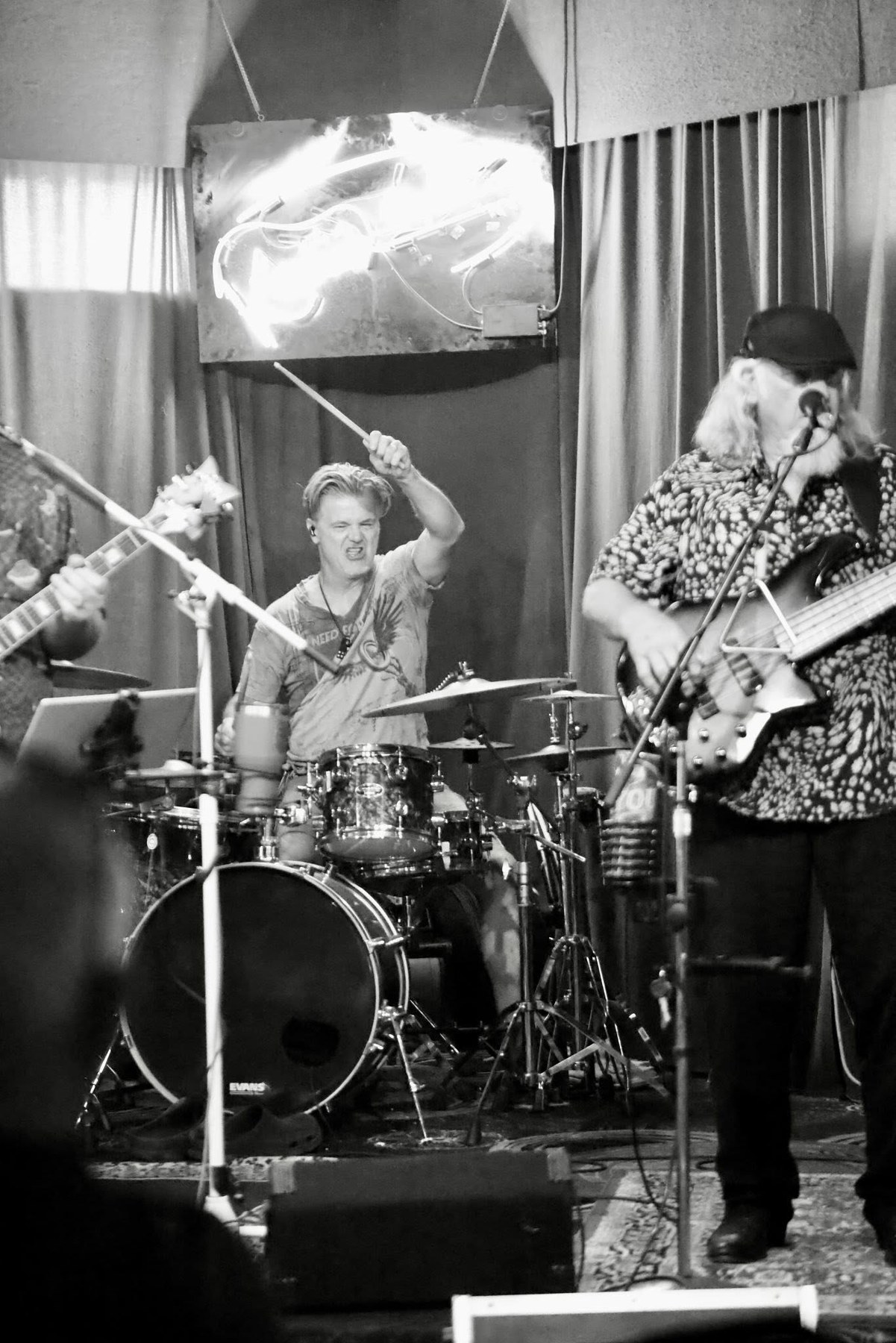 Drums and bass performance in black and white